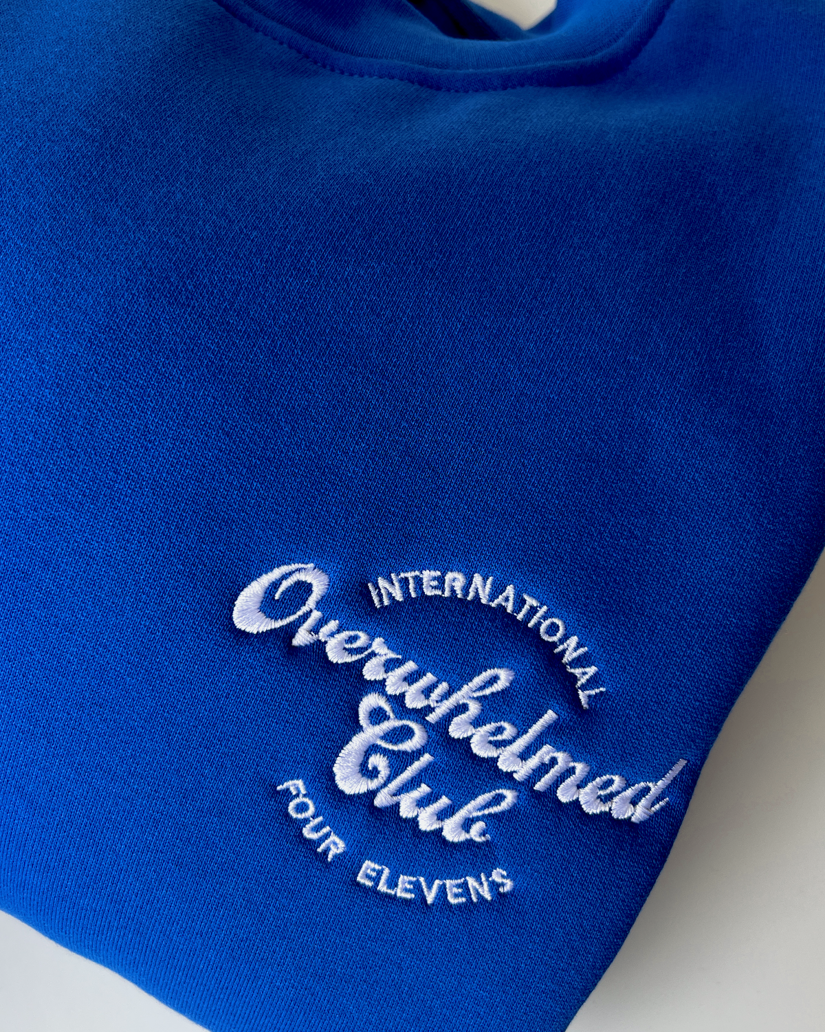 Overwhelmed Club Blue & White Sweat